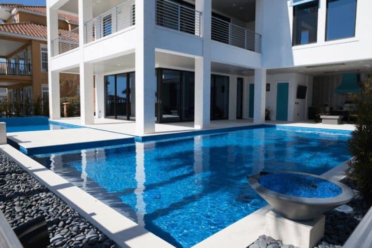 Ocean Reef White coping, deck and columns brushed finish